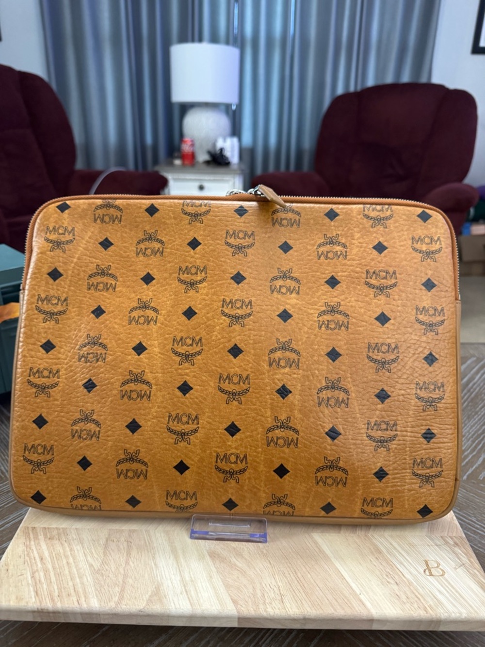 MCM's Visetos Original line, the brand's  monogrammed coated canvas. Laptop Case